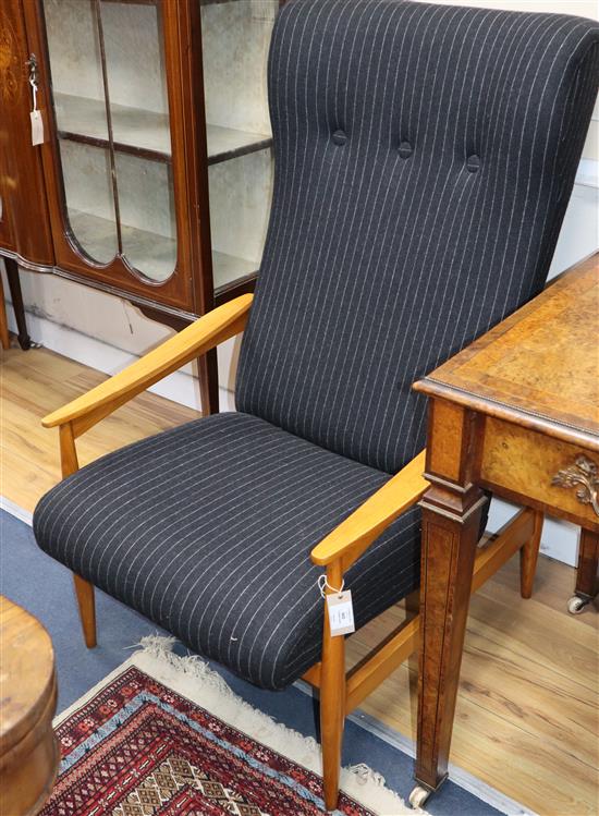 Two Scandanavian teak mid 20th century armchairs, re-upholstered